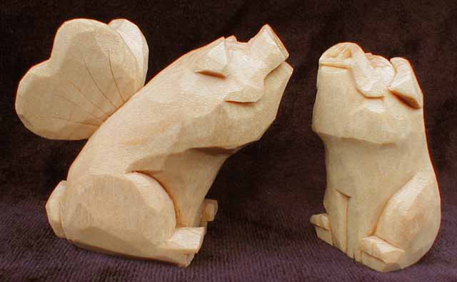 two pigs carved